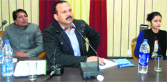ADC Sandeep Kumar interacts with PIOs and APIOs at a recently held RTI workshop in Chamba.