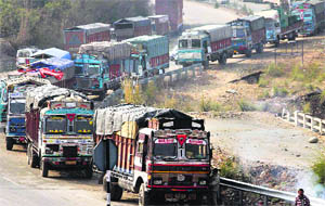 Trucks stranded due to the closure of the Jammu-Srinagar national highway on Wednesday.