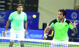 Rohan Bopanna (left) and Pakistan's Aisam ul-Haq Qureshi beat Stanislas Wawrinka and Benoit Paire 6-4 4-6 11-9 in their doubles first round match of Chennai Open late on Tuesday