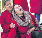 Artists from NGO Empower People perform during a street play at Gandhi Park in Dehradun on Thursday. A tribune photograph