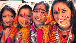 Girls in the traditional Kumauni dress at the Yuva Mahotsav at Town Hall in Dehradun on Thursday. Tribune photo: Vinod Pundir