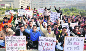 Striking nurses, paramedical and clerical staff of the Punjab Institute of Medical Sciences (PIMS) protest on the 24th day against the Punjab Government and the PIMS management for the non-payment of their salaries in Jalandhar on Thursday.