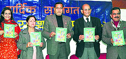 Minister for PHE, irrigation and flood control Sham Lal Sharma (second from left) releases a childrens story book in Jammu on Thursday