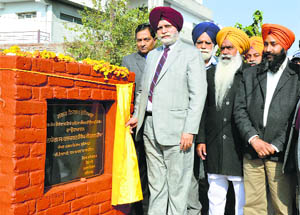 Mayor Harcharan Singh Gohalwadia lays the foundation stone of the sub-zone and Suwidha Centre in Zone C near Dholewal Chowk in Ludhiana on Thursday.
