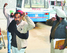 The unemployed linemen being taken to a court in Fatehgarh Sahib. 