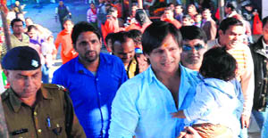 Actor Vivek Oberoi with his child in Haridwar on Thursday. 