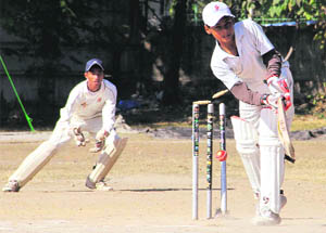 A batsman gets bowled in a match in the Banke Lal Shah Memorial Under-15 Cricket Tournament at the Rangers College ground in Dehradun on Friday. 