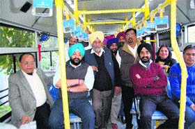 CPS Inderbir Bularia, Mayor Bakshi Ram Arora, MC Commissioner DPS Kharbanda take a ride in a low-floor bus in Amritsar on Saturday