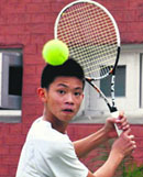 Lee Ho Jun returns a shot to Lavish Nehra during the ITF Junior-1 Tennis Tournament at the CLTA in Chandigarh on Saturday.