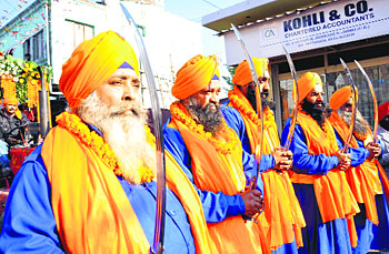 Panch Pyare during a religious procession in Dehradun.