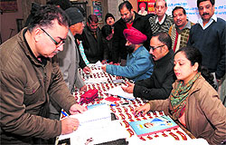 Food business operators register themselves during a camp organised by the Health Department at Gur Mandi in Jalandhar on Saturday