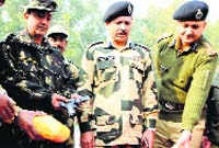 Ajay Kumar Tomar (centre), IG, BSF, at a press conference in Ram Tirath near Amritsar on Saturday. Photo: Vishal Kumar