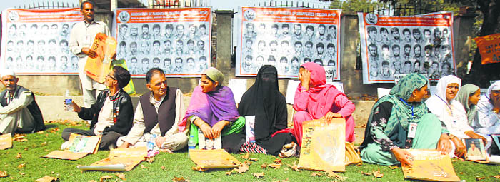 Members of Association of Parents of Disappeared Persons protest silently in Srinagar. 