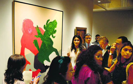 Visitors crowd around Tyeb Mehta’s “Mahisasura” during a media preview ahead of Christie’s first auction in India, in Mumbai recently.