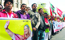 Ruling Bangladesh party Awami League supporters make a human chain in Dhaka on Saturday