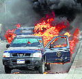 A car torched by students of al-Azhar University demanding the reinstatement of deposed Islamist President Mohamed Morsi, in Cairo on Saturday