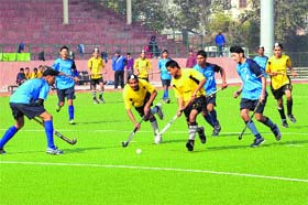 Players in action during the final match in the under-17 hockey championship in Bathinda