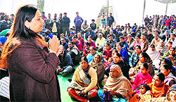 BSP councillor Jannat Jahan-Ul-Haq addresses residents of Deep Complex at Hallo Majra in Chandigarh on Sunday