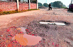 A damaged road at Chappar Chhiri village in Mohali district
