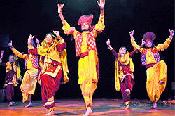 Artistes present a Punjabi folk dance at Tagore Theatre in Chandigarh on Sunday