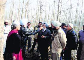 Residents of Rail Mazra village protest against the laying of underground high voltage wires by a private power transmission company