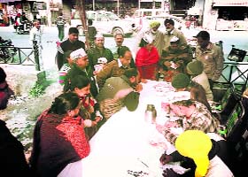 AAM AADMI BECKONS: AAP activists recruit members at Ambedkar Chowk in Nawanshahr on Sunday