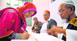 Polling in progress at a booth in Dhaka on Sunday.