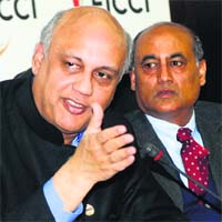 Ficci president Sidharth Birla with ex-president KV Kanoria addresses a press conference in New Delhi on Monday