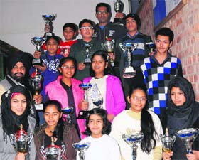 Winners of the State Carrom Championship in a jubilant mood at St Stephen’s School in Sector 45, Chandigarh, on Monday