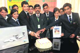 Students of the Department of Aerospace & Aeronautical Engineering and staff of Gurukul Vidyapeeth cut a cake to celebrate the launch of GSAT-14 by ISRO