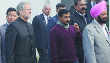 Lt. Governor Najeeb Jung, Chief Minister Arvind Kejriwal and Speaker Maninder Singh Dhir during a procession to the ongoing Delhi Vidhan Sabha session in New Delhi on Monday. 