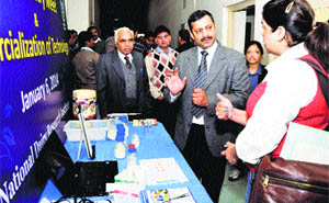 Dr Rajan Sharma explains about the use of paper kit to detect milk adulteration in Karnal on Monday. 
