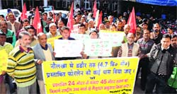 Members of various Left organisations stage a protest at the DC office in Mandi on Monday. Photo: Jai Kuma