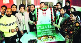 Leaders of the Awami National Conference pay floral tributes to founder of the party GM Shah on his death anniversary in Jammu on Monday