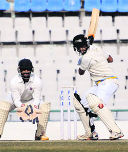 A cricket match between Maharashtra and Punjab in progress at the PCA Stadium in Mohali on Tuesday