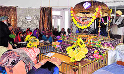 Devotees pay obeisance at Gol Gurdwara in Haridwar on Tuesday to celebrate Prakash Utsav of Guru Gobind Singh