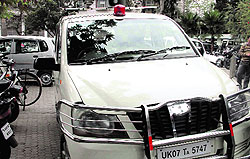Despite a ban on red-beacons atop vehicles, a Congress legislators vehicle with the red-beacon at the Secretariat in Dehradun on Tuesday