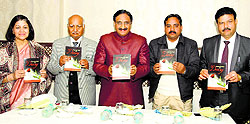 Former Uttarakhand Chief Minister Ramesh Pokhriyal Nishank releases a book at a function in Dehradun on Tuesday