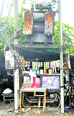 A makeshift shop under a transformer near Karan Tal Park on the Railway Road in Karnal