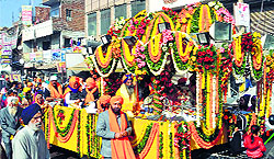 Devotees take out a nagar kirtan procession on the occasion of the birth anniversary of Guru Gobind Singh in Faridabad on Tuesday