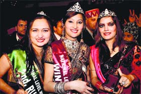 Winter Queen contest winner Tanuja Thakur(centre) with first runner-up Sarika (right) and second runner-up Anmol Garg at Manali on Tuesday