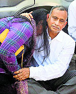 Devyanis father Uttam Khobragade and sister Sharmishtha protest outside the American mission in Mumbai on Tuesday