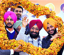 PPCC chief Partap Bajwa (centre) at a function in Mansa on Tuesday