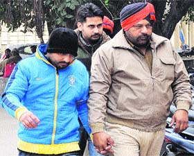 The two youths who resorted to firing in the air being produced in a court in Jalandhar on Tuesday