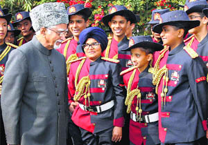 Vice-President Hamid Ansari interacts with NCC cadets after inaugurating the NCC Republic Day parade camp in New Delhi. 
