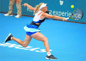 Caroline Wozniacki reaches for a backhand against Lucie Safarova during their second round match at the Sydney International on Tuesday. 