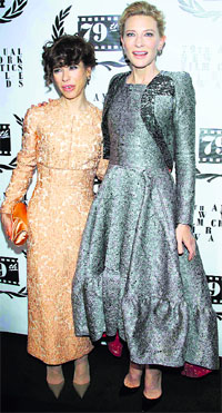 Actress Sally Hawkins (L) and Cate Blanchett pose for a photo as they arrive for the New York Film Critics Circle Awards in New York.