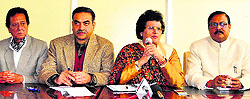 Aarti Mehra, in charge, BJP, Chandigarh, (third from left) addresses mediapersons at the party office in Sector 33, Chandigarh, on Wednesday. Also seen in the picture are Satya Pal Jain (extreme right), Sanjay Tandon (second from left) and Harmohan Dhawan