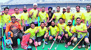 AG Punjab team in a jubilant mood after winning the final match of the North Zone Indian Audit and Accounts Department Hockey Tournament at Hockey Stadium, Sector 42, Chandigarh, on Wednesday