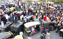 Members of an auto-rickshaw union protest in Rohtak on Wednesday. Photo: Manoj Dhaka